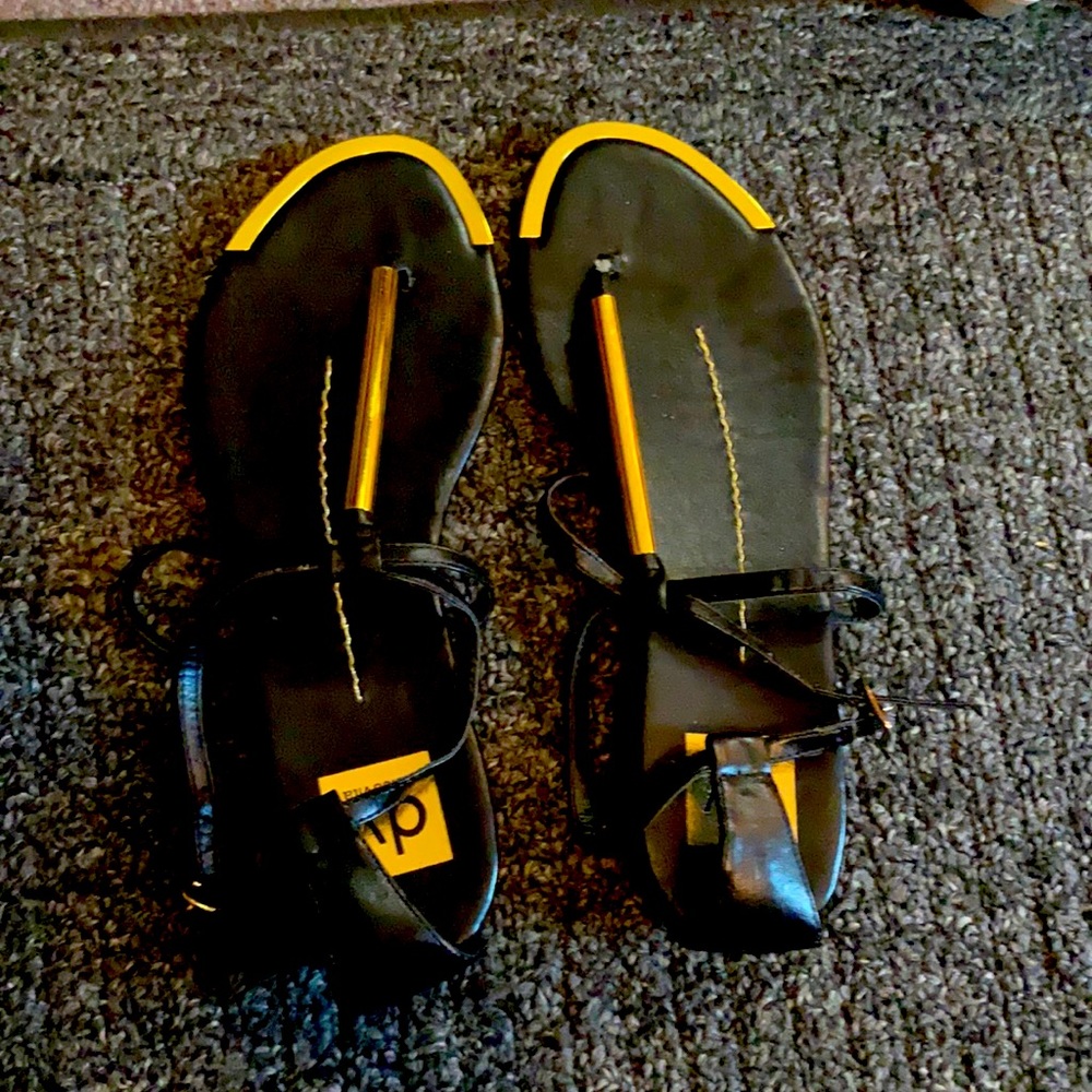 Black and gold Dolce Vita flat sandals